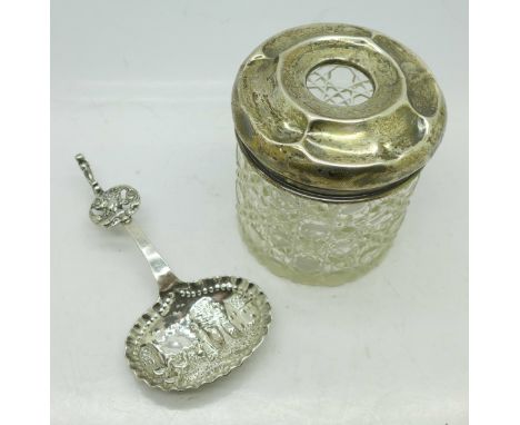 A silver topped jar and a Dutch silver caddy spoon, 40.4g