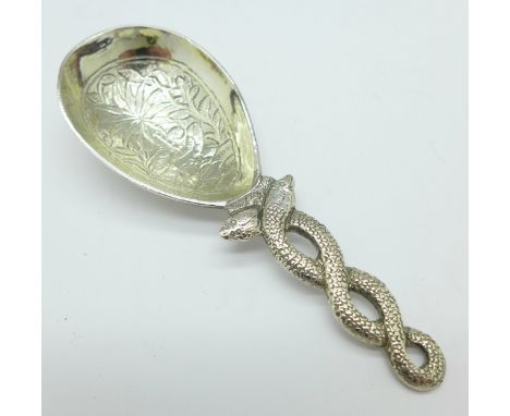 An Indian silver caddy spoon