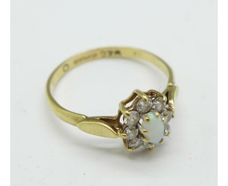 A 9ct gold, opal and white stone cluster ring, 1.8g, O