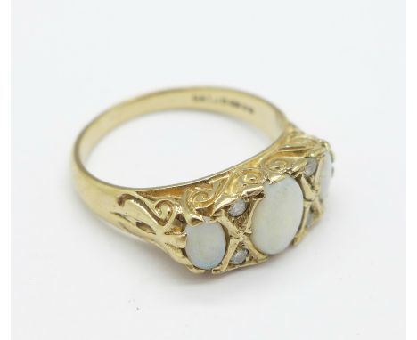 A 9ct gold, opal and white stone ring, 3.2g, N