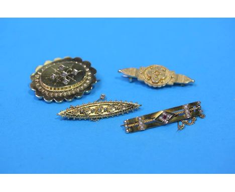 Four 15ct gold brooches, one set with diamonds, another with ruby and seed pearls. Weight 22.8 grams