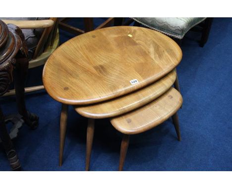 A set of Ercol Golden Dawn 'Pebble' nest of tables