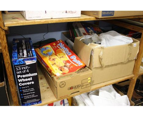 Shelf of assorted games etc.