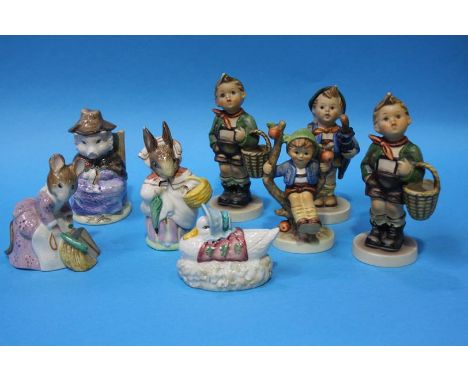 Four Hummel figures and four Royal Albert Beatrix Potter figures