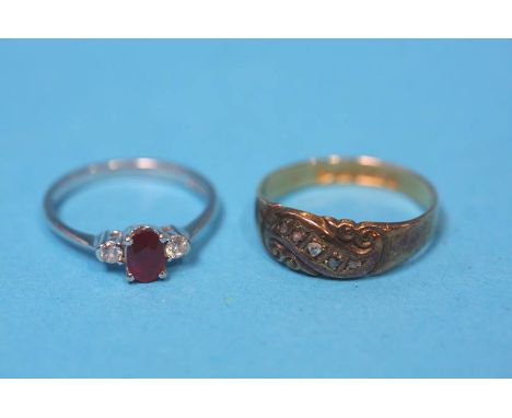 A 15ct gold ring and a 9ct white gold ruby and diamond ring