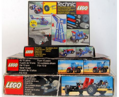 A good collection of 4x vintage early Lego Technics sets. To include 2x 8050 'Universal Building Set', 8859 Tractor, and 8860