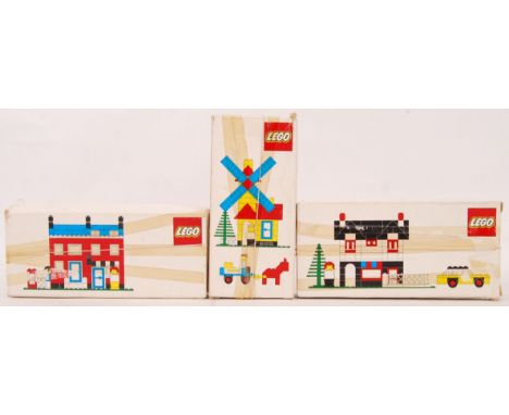 A collection of 3x original vintage 1970's Lego Weetabix sets. Sets include; windmill, house & shop. All within their origina