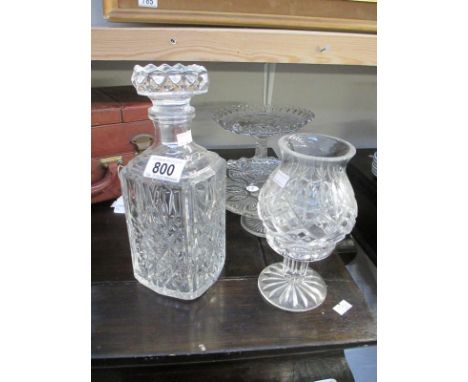 A decanter and other glass and crystal items