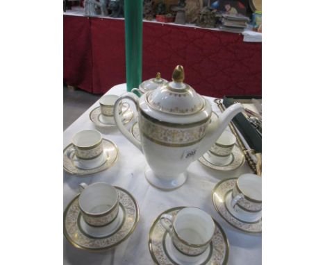 A nice 8 place tea set incuding teapot etc