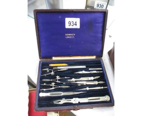 A cased Rowney protractor set