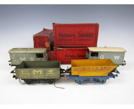 Four boxed Hornby Series items of O-Gauge rolling stock, including RS655 Brake Van (2), W604 Wagon No.1 and RS678 Rotary Tipp