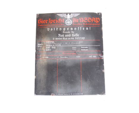 A German Third Reich enamel Hier Spricht Die NSDAP sign as displayed outside the entrance to Nazi Party offices, 78 cm x 64 c