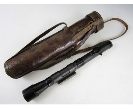 A First World War Periscopic Prism Co telescopic sight, numbered 6775, in matching leather case