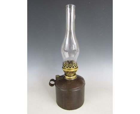 An LMS railway oil lamp, 20 cm to top of burner