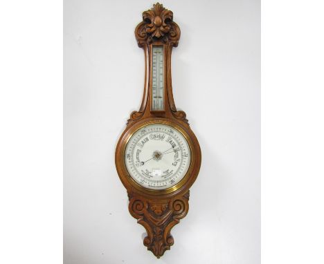 A late 19th / early 20th Century oak banjo barometer, 91 cm