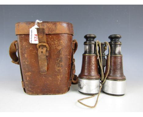 A cased pair of 1905 dated and Indian Ordnance marked binoculars, the case bearing the name of Pte H Higgins, 1st KSLI