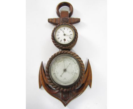 An early 20th Century oak cased wall clock with aneroid barometer, carved in the form of a ship's anchor, 54 cm
