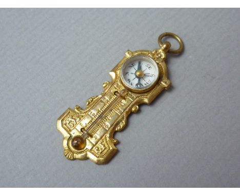 A late 19th / early 20th Century rolled gold novelty fob, with integral compass and thermometer 