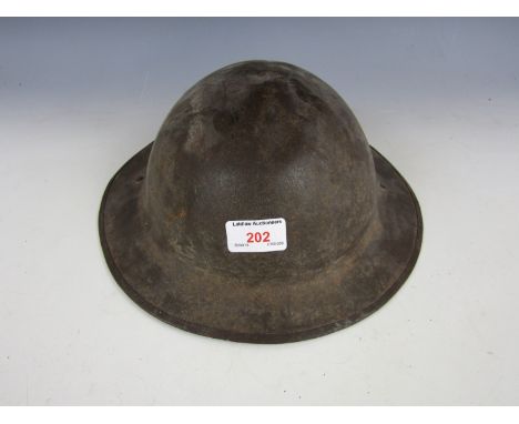 A First World War British Brodie pattern steel helmet