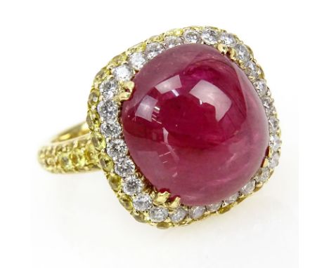 Approx. 11.50 Carat Cabochon Burma Ruby, 2.03 Carat Diamond and 14 Karat Yellow Gold Ring. Ruby with vivid saturation of colo