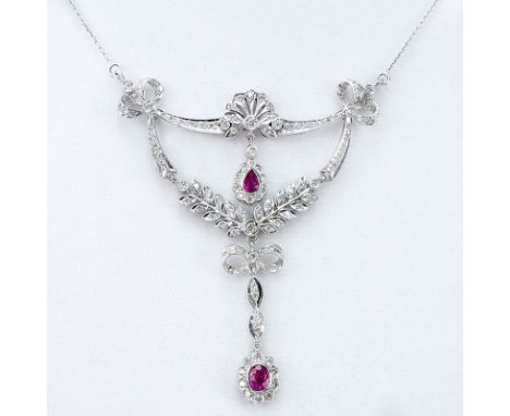Edwardian style Diamond, Ruby and 18 Karat White Gold Pendant Necklace. Clasp signed 18K. Very good condition. Pendant measur