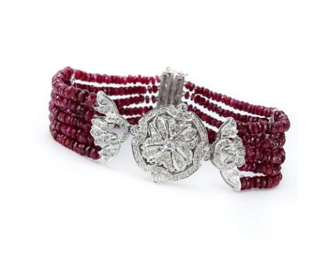 Antique style Approx. 58.81 Carat Ruby Bead, .54 Carat Pave Set Diamond and 14 Karat White Gold Five (5) Strand Bracelet. Sta