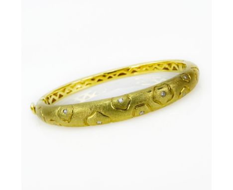 Vintage 18 Karat Yellow Gold Bangle Bracelet set with Approx. .25 Carat Round Cut Diamonds. Stamped 750. Very good vintage co