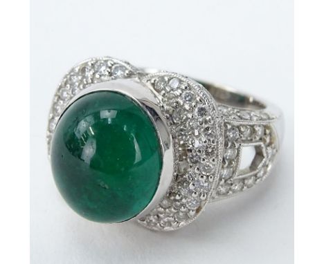 Approx. 5.50 Carat Cabochon Emerald, 1.75 Carat Pave Set Round Brilliant Cut Diamond and 18 karat White Gold Ring. Emerald wi