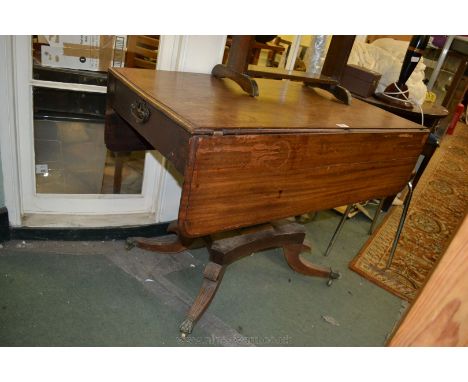 A mid 19th c. Mahogany Sofa Table having rectangular top with rounded corner drop leaves and single frieze Oak lined drawer t