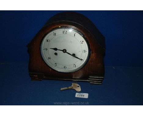 A Mantel Clock with pendulum and key