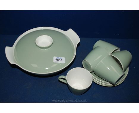 A quantity of celadon green Poole china including cups and saucers, casserole, etc.