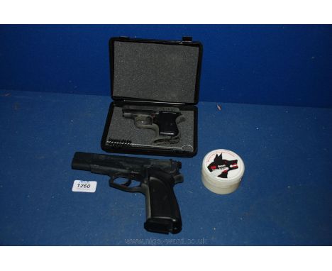 A BBM 315 calibre, 8 mm boxed with blanks and a replica Browning model GP DA8 handgun.