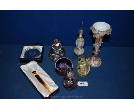 A small quantity of coloured glass vases, perfume bottles and paperweights including a Caithness Moonflower, House of Marble 