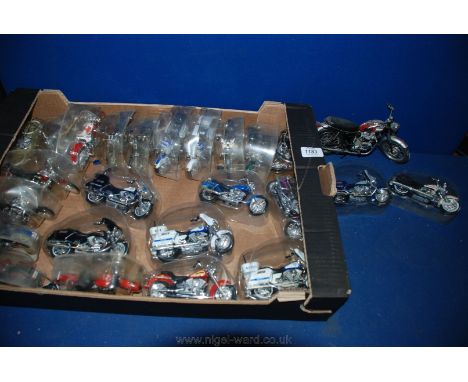 A box of 24 model Harley Davidson Motorbikes still in original plastic wrapping including Police and Military models by Maist