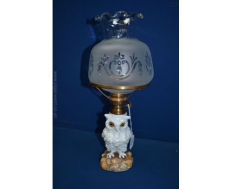 An Oil lamp (repaired) and shade in the form of an Owl.