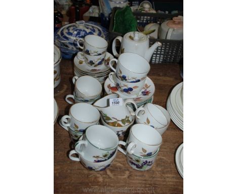 A quantity of Royal Worcester 'Evesham' Tea and coffee ware including six teacups, four saucers and tea plates, three breakfa