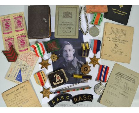 A set of 5 WWII Medals including 1939-45 War Medal, Defence Medal, 1939-1945 Star, Africa and Italy Stars, in original box ad