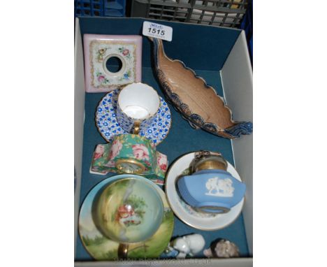 A small quantity of china including a Vistoria Cup and saucer, Wedgwood lighter, blue and gilt Copeland cup and saucer, Wade 