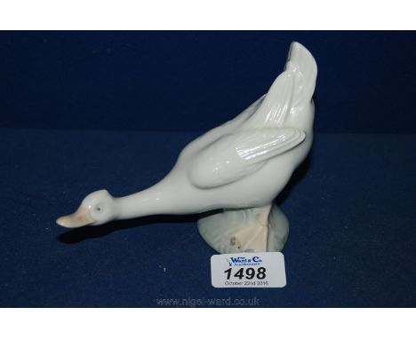 A Nao figure of a Goose, 6'' long, 4 3/4'' tall.