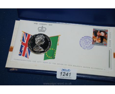 A 1977 Queen Elizabeth II twenty five Dollar Silver Coin of the Cook Islands with first day cover