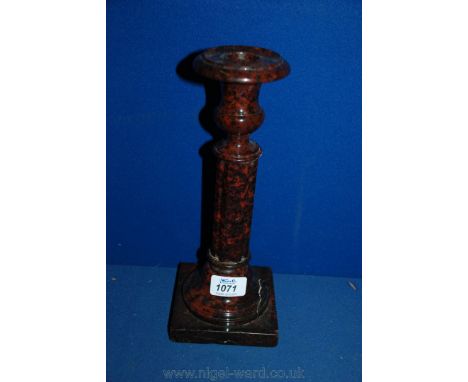 A large Cornish red Serpentine Candlestick, 12'' tall.