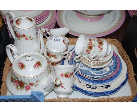 A Paragon 'English Rose' pattern tea/coffee set including tea and coffee pot, six cups and saucers, milk jug and sugar bowl t