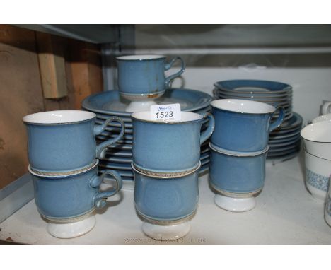 Miscellaneous Denby dinnerware including six each different sized plates and seven cups and saucers.