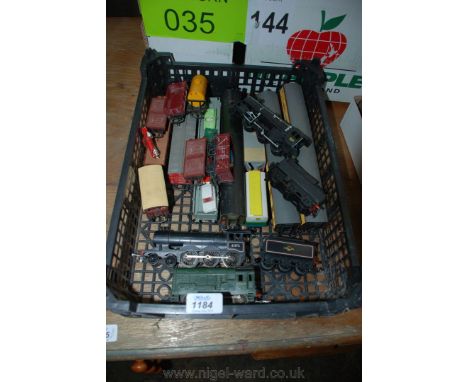 A quantity of Tri-ang model train set engines and carriages including steam locomotive 61572, a D3035 shunt engine, two passe