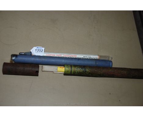 A Dairy Thermometer and Tapers in container