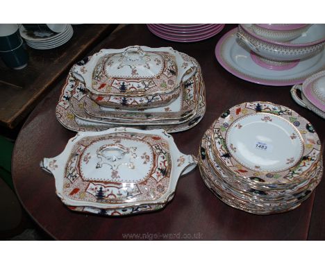 A part Dinner service including three graduated meat plates, two lidded tureens, dinner, tea and side plates in oriental and 