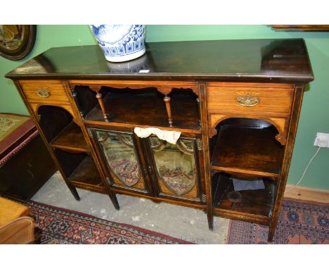 A good Edwardian Rosewood Sideboard having rectangular moulded edge top, over central shelf with spindle turned supports and 