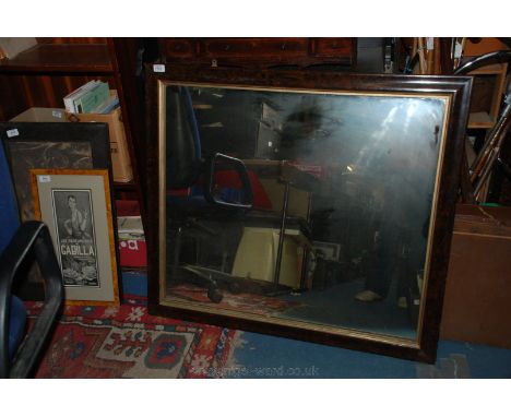 A large wooden framed Wall Mirror, 34'' x 29''.