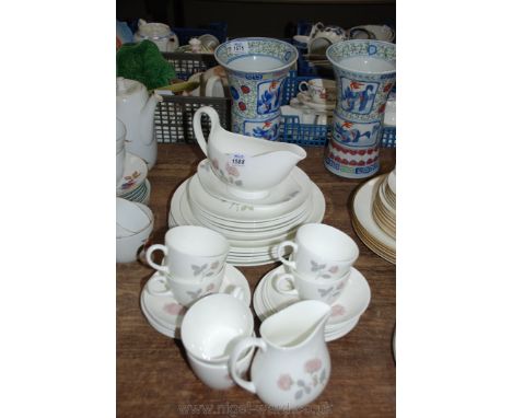 A vintage Wedgwood 'Flame Rose' part Dinner/tea service, six each cups, saucers, tea, dinner and side plates, gravy boat and 