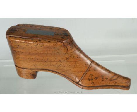 A Table Snuff Box in the form of a shoe, possibly Scottish, with brass inlaid pinhead decoration, 5 1/2'' long, 2 1/4'' tall.